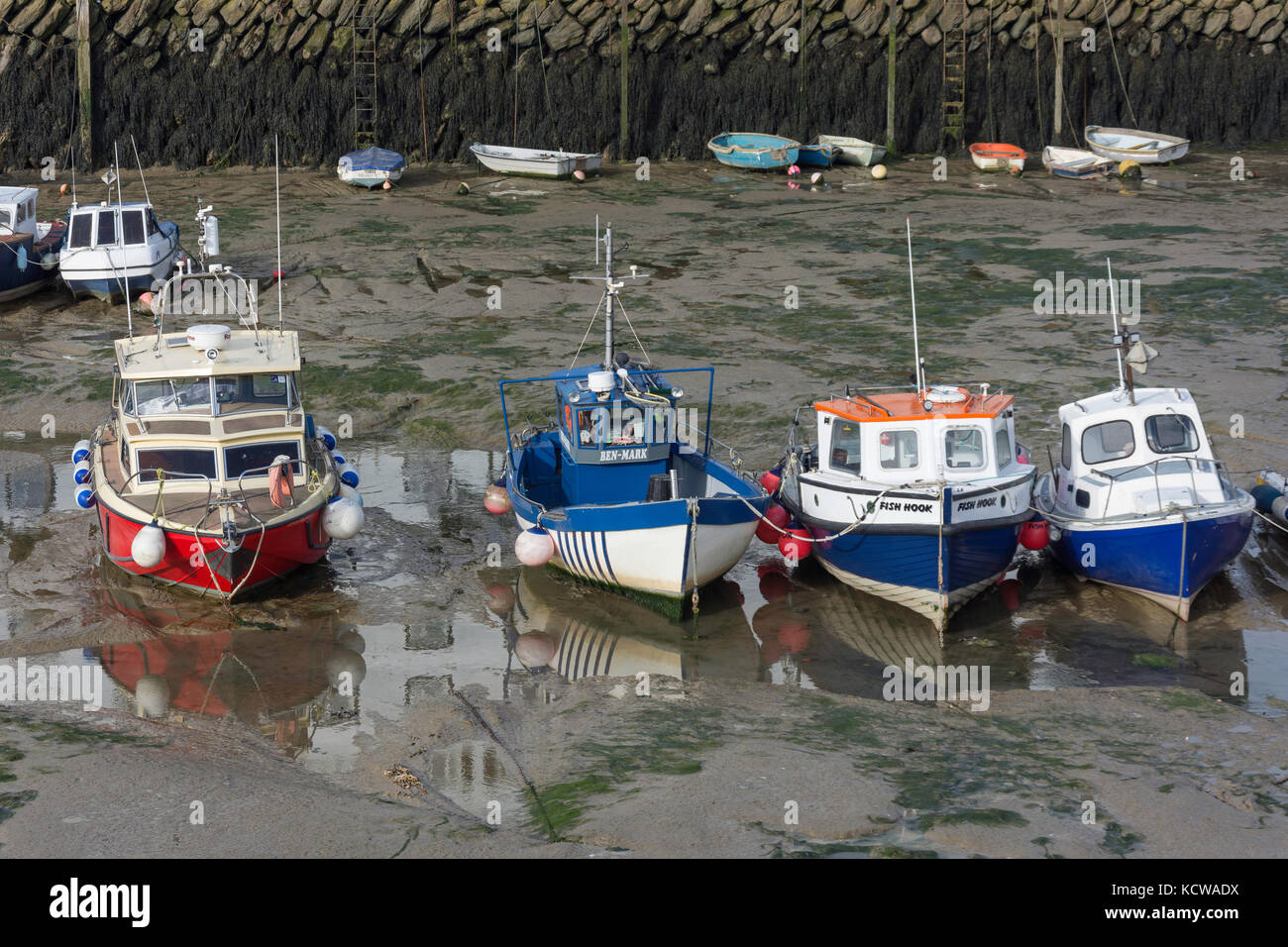 Fishing boats at low tide, Folkestone Harbour, Folkestone, Kent, England, United Kingdom Stock Photo