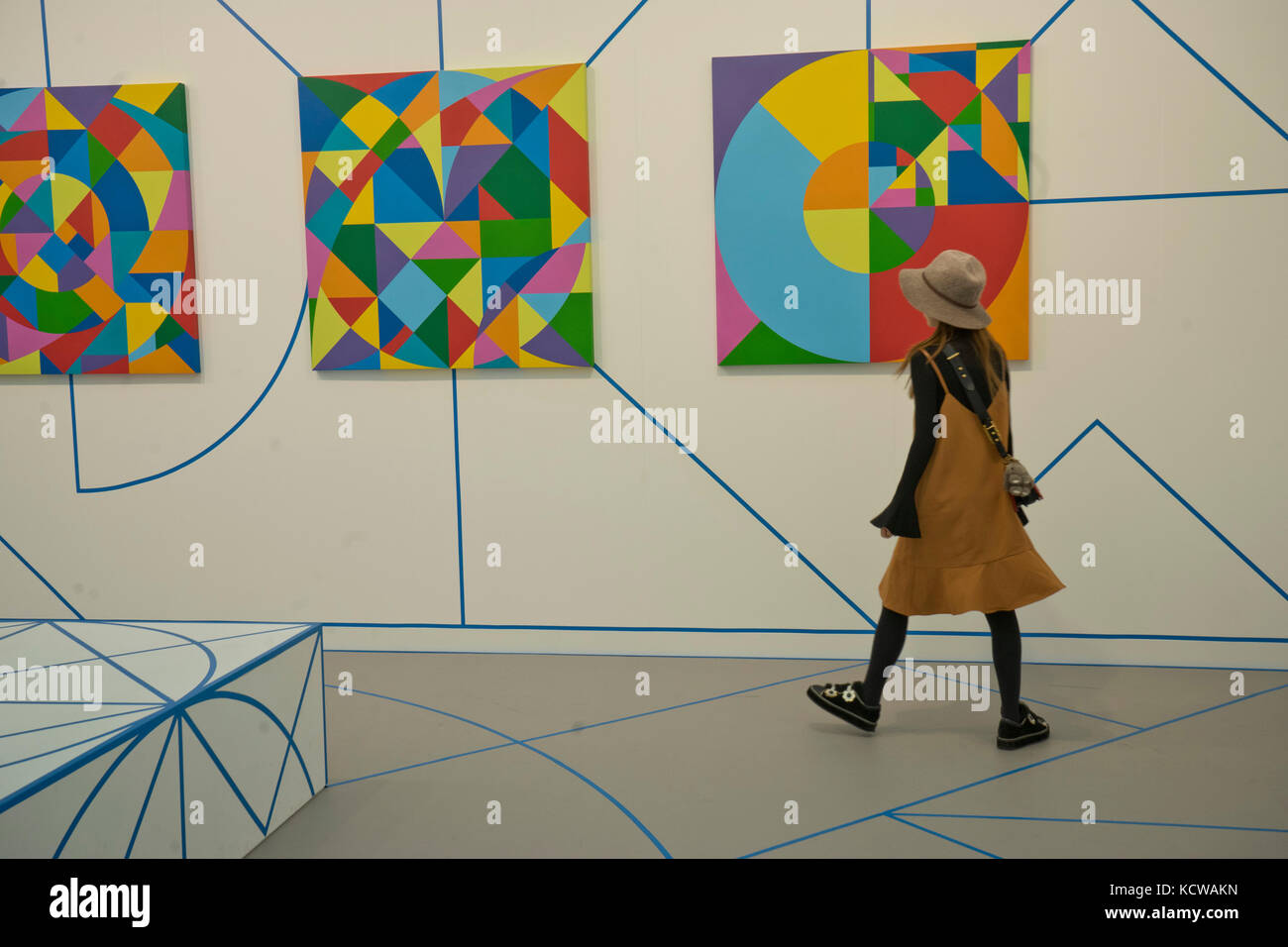 Visitor to the Frieze International Arts Fair at Regent's Park, London ...