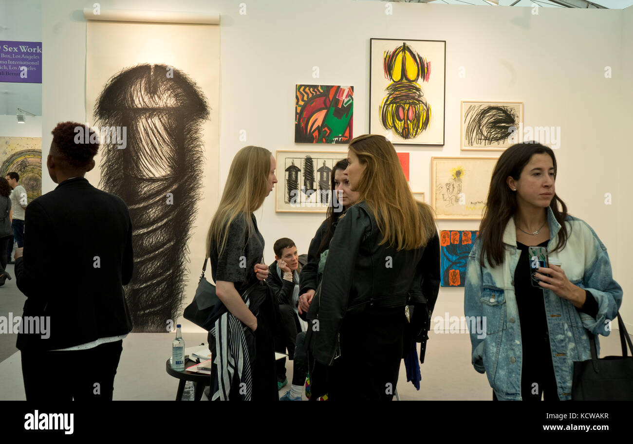 Visitors to the Frieze International Arts Fair at Regent's Park, London ...
