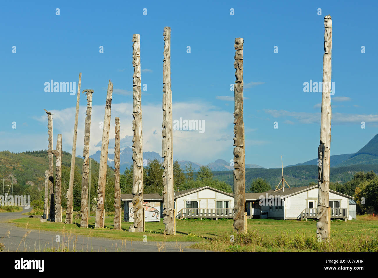 Kitwanga Totem Poles. Gitwangak or Gitwangax. Gitanyow. Gitksan people. Northwest Coast First Nations. Nass Range of mountains , Kitwanga, British Columbia, Canada Stock Photo