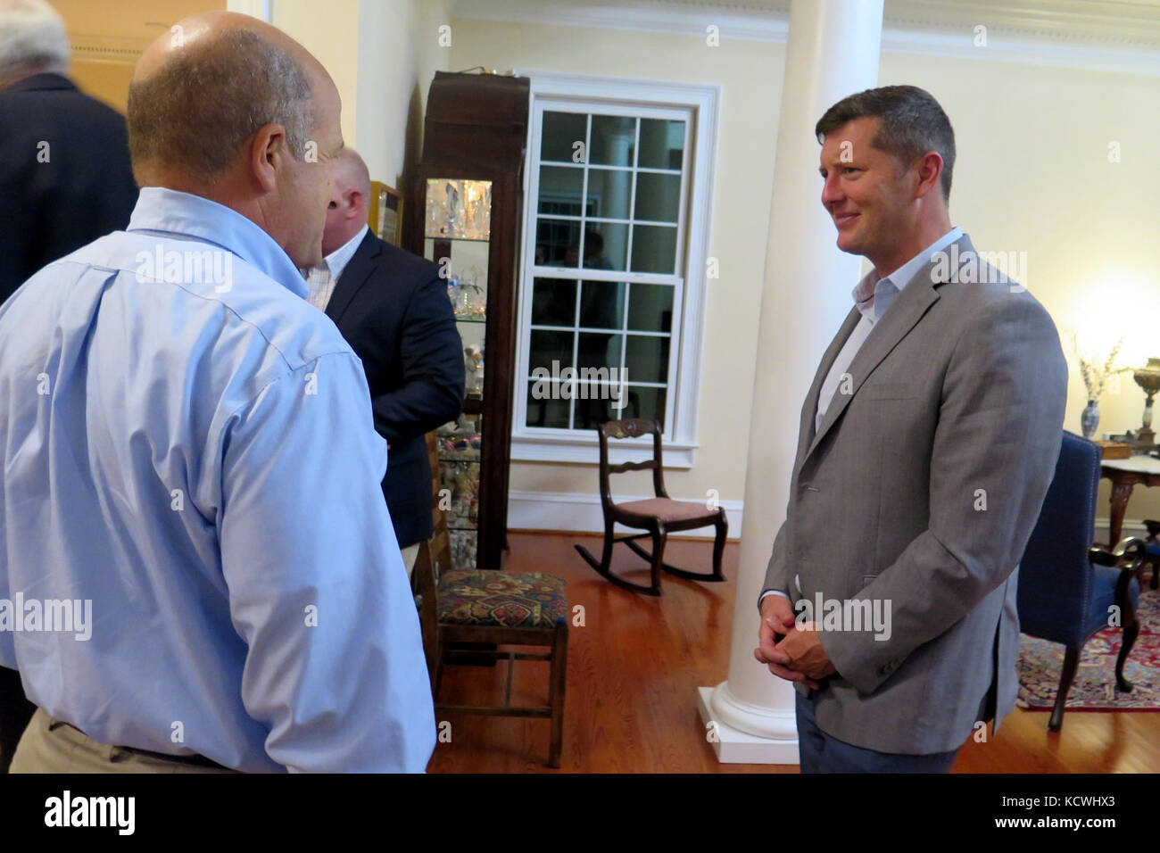 Under Secretary of the Army Mr. Patrick J. Murphy visits with U.S. Army Maj. Gen. Robert E. Livingston, Jr., the adjutant general for South Carolina at a reception in his honor during his visit to South Carolina in West Columbia, South Carolina, September 28, 2016. The Under Secretary was in the state to meet with Soldiers in the South Carolina Army National Guard, Fort Jackson, U.S. Army Central Command and cadets from the Citadel. (U.S. Army National Guard photo by Lt. Col. Cindi King) Stock Photo