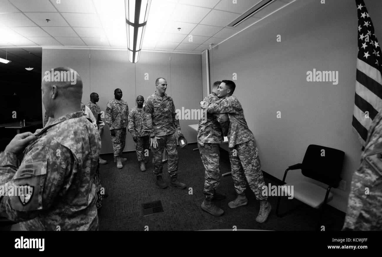 U.S. Army Master Sgt. Bernie H. Ochoa, Headquarters and Headquarters Detachment, 59th Aviation Troop Command (ATC), S.C. National Guard, is promoted to the rank of sergeant major, McEntire Joint National Guard Base (JNGB), Eastover, S.C., Oct. 15, 2016. Formerly senior operations-noncommissioned officer for 1-151st Attack and Reconnaissance Battalion, 59th ATC (Brigade), Ochoa will continue his career as the brigadeâs operations sergeant major. (U.S. Army National Guard Photo by Staff Sgt. Roberto Di Giovine/Released) Stock Photo