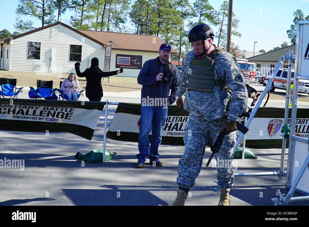 U.S. Army Brig. Gen. R. Van McCarty, Deputy Adjutant General, South Carolina National Guard, competes in the “Battle Challenge” mobile obstacle course at McCrady Training Center in Eastover, South Carolina, Jan. 28, 2017. The Battle Challenge requires participants to perform nine tasks under pressure of time, including a cargo net climb, a knotted rope descent, wall surmount, ammunition resupply, low crawl, gas can carry, marksmanship tasks, and a service member-down rescue. (U.S. Army National Guard photo by Capt. Brian Hare) Stock Photo