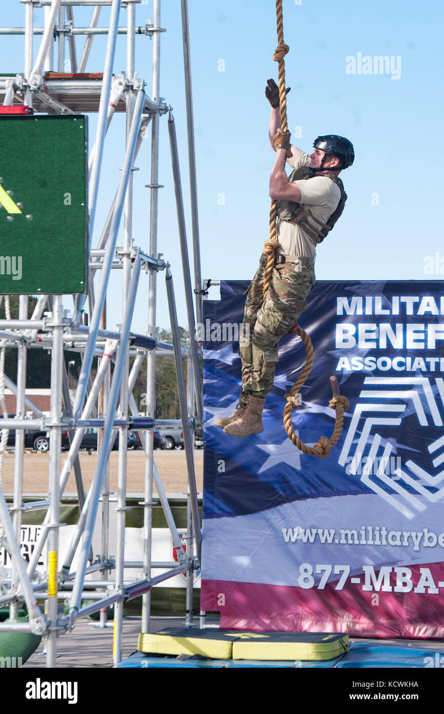 The South Carolina National Guard hosted its first “Battle Challenge” at McCrady Training Center in Eastover, South Carolina, Jan. 28-31, 2017. The Battle Challenge is a mobile obstacle course requiring participants to perform nine tasks under pressure of time, including a cargo net climb, a knotted rope descent, wall surmount, ammunition resupply, low crawl, gas can carry, marksmanship tasks, and a service member-down rescue. The event was open to all military service members, law enforcement, first responders, firefighters, protective services and their 18 and older family members. (U.S. Arm Stock Photo
