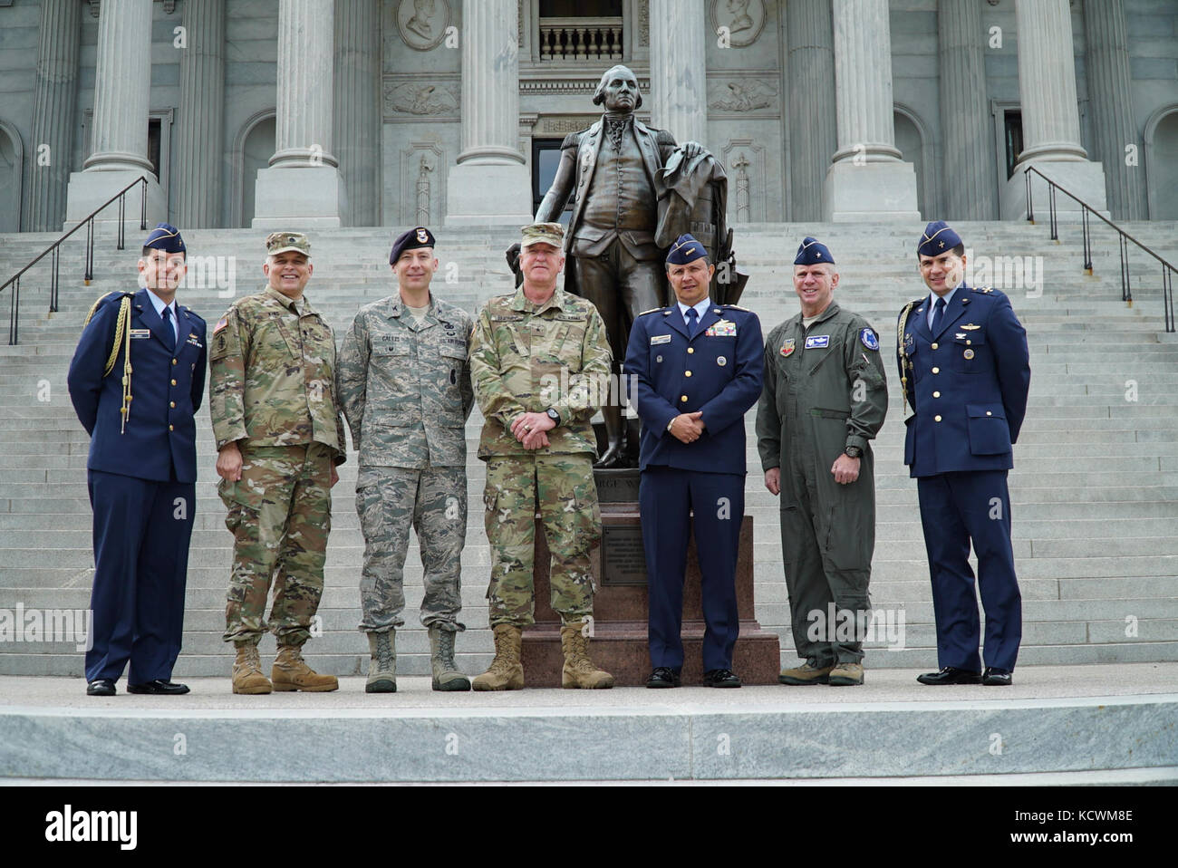 Colombian Air Force Gen. Carlos Eduardo Bueno Vargas, Colombian Air Force commander, stands in front of the State House during a state partnership engagement, Columbia, South Carolina, Feb. 21, 2017. Also pictured is Colombian Air Force Maj. Juan Camilo Nunez, U.S. Army Lt. Col. David King, U.S. Air Force Col. Chris Callis, U.S. Army Brig. Gen. Timothy J. Sheriff, deputy commanding general of the 263rd Army Air and Missile Defense Command, U.S. Air Force Brig. Gen. R. Scott Lambe, South Carolina Air National Guard chief of staff, and Colombian Air Force Col. Juan Carlos Rueda Cartagena. (U.S.  Stock Photo