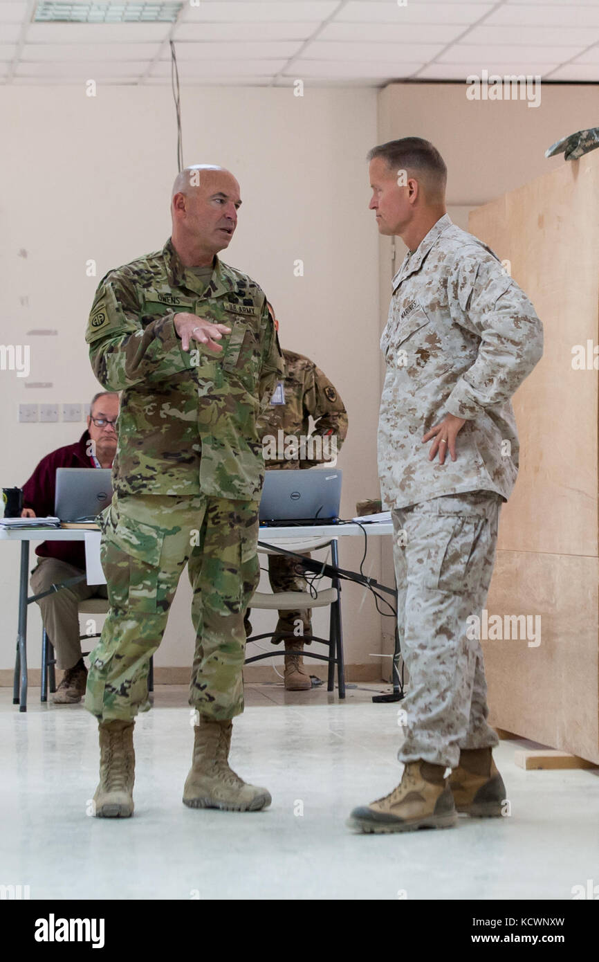 U.S. Army Brig. Gen. Brad Owens, South Carolina National Guard director of joint staff, briefs U.S. Marine Corps Maj. Gen. Carl E. Mundy, III, 5th Marine Expeditionary Brigade commander, about the Higher Control (HICON) operations for Eager Lion 16, May 21, 2016. Eager Lion 16 is a bilateral, scenario-based exercise with the Hashemite Kingdom of Jordan, designed to exchange military expertise and improve interoperability among partner nations. As part of Eager Lion 16, Owens is the HICON director and Coalition Forces Headquarters commander, and Mundy is the Combined Joint Task Force deputy com Stock Photo
