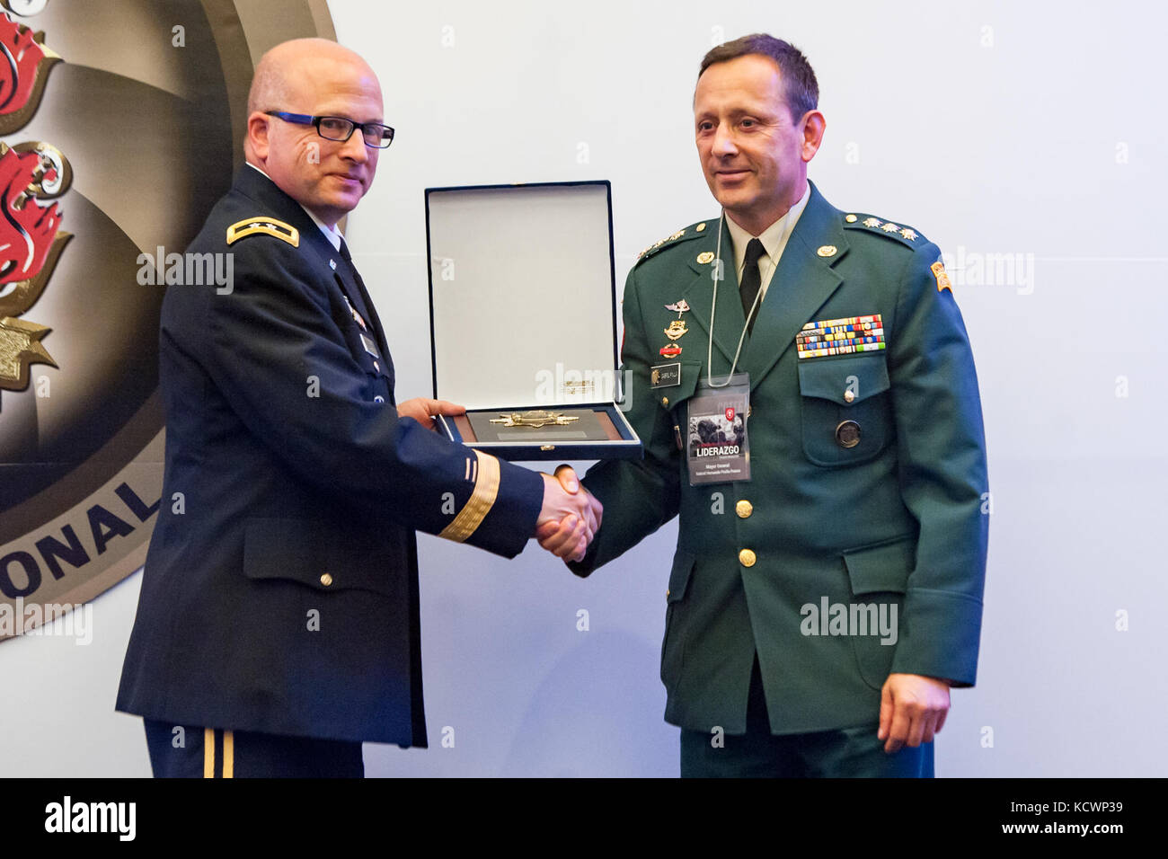 U.S. Army Maj. Gen. Robert E. Livingston, Jr., the adjutant general for South Carolina, receives a token of appreciation from the Colombian Army after speaking at the Transformation Symposium, Bogota, Colombia, Aug. 5, 2016. (Photo by Sgt. Brian Calhoun, 108th Public Affairs Det.) Stock Photo