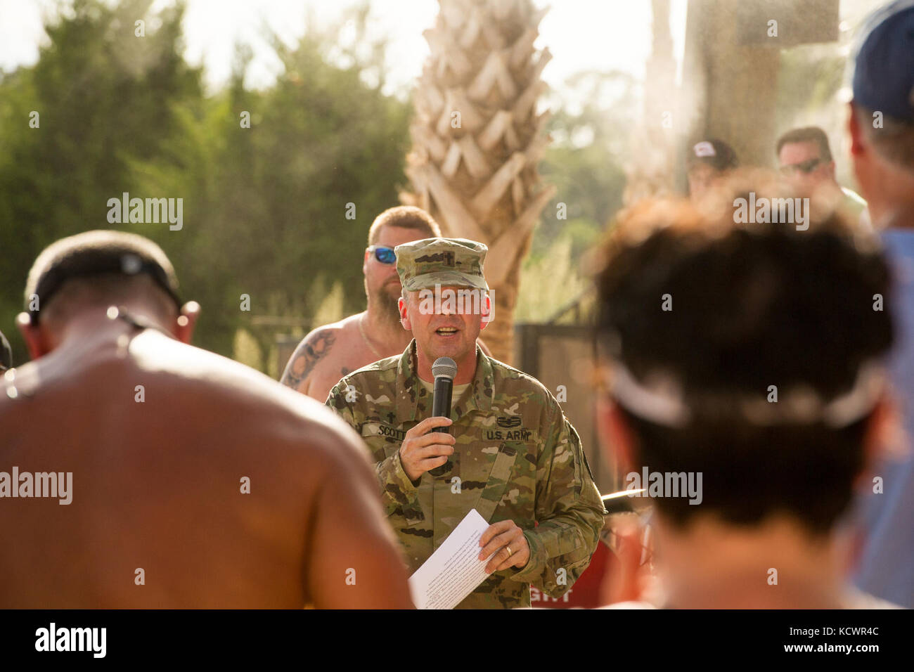 U.S. Army Chaplain Lt. Col. Clyde Scott gives a prayer at the Frayed Knot on Lake Murray, S.C., during a memorial for Army Sgts First Class Charles Judge, Jr., and Jonathon Prins, July 29, 2016.  The two soldiers were killed while attempting to protect a woman who was allegedly being attacked by a gunman. The boat procession was a way to celebrate their lives.  (U.S. Air National Guard photo by Tech. Sgt. Jorge Intriago) Stock Photo