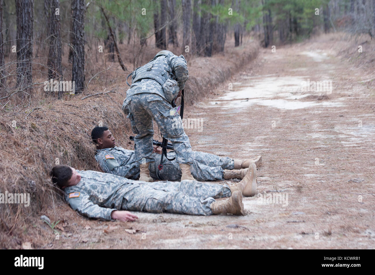 Officer Candidate School (OCS) Class 67 candidates of the 218th Leadership Regiment (LDR), South Carolina National Guard, conduct tactics training during phase 2 of OCS March 5, 2016, at McCrady Training Center in Eastover, S.C. Scouts assigned to Headquarters and Headquarters Company, 1-118th Infantry Battalion from Mullins, S.C. provide opposing forces for the candidates as they trained to cross danger areas, react to simulated hostile contact and effectively communicate with higher authority. (U.S. Army National Guard photo by Sgt. Brian Calhoun, 108th Public Affairs Det/Released) Stock Photo