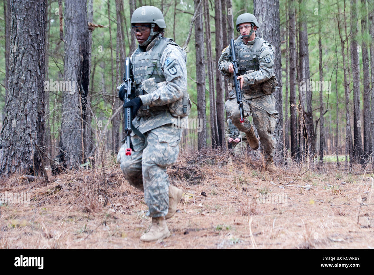 Officer Candidate School (OCS) Class 67 candidates of the 218th Leadership Regiment (LDR), South Carolina National Guard, conduct tactics training during phase 2 of OCS March 5, 2016, at McCrady Training Center in Eastover, S.C. Scouts assigned to Headquarters and Headquarters Company, 1-118th Infantry Battalion from Mullins, S.C. provide opposing forces for the candidates as they trained to cross danger areas, react to simulated hostile contact and effectively communicate with higher authority. (U.S. Army National Guard photo by Sgt. Brian Calhoun, 108th Public Affairs Det/Released) Stock Photo