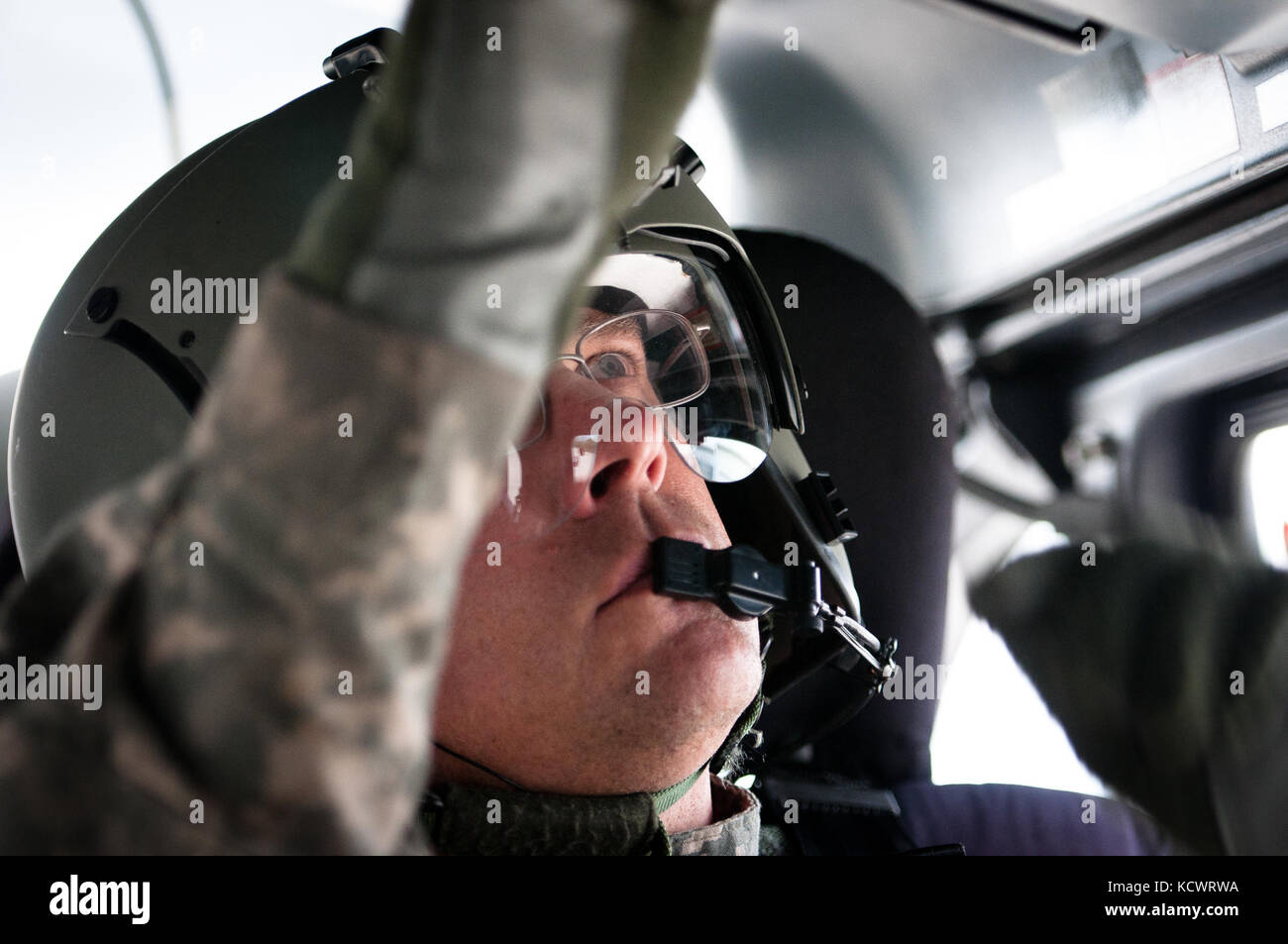U.S. Army Cpt. Jon Strickland, Warrant Officer Eric Ponder, and Staff