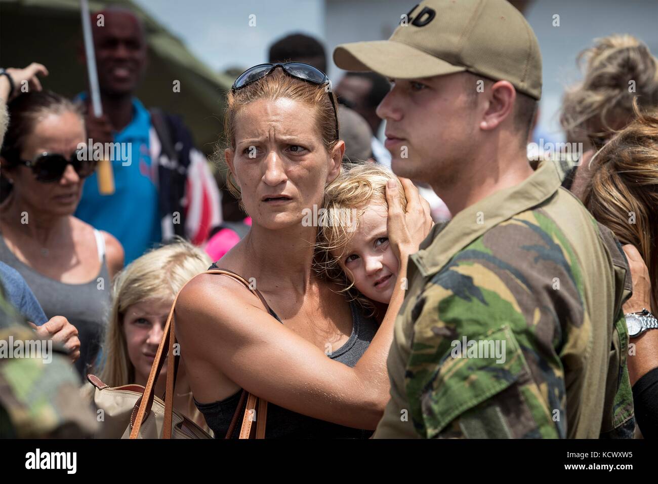 Royal Dutch Marines assist with evacuation of residents and tourists stranded in the aftermath of Hurricane Irma that devastated much of the Leeward Islands September 14, 2017 in Philipsburg, St. Maarten. Stock Photo