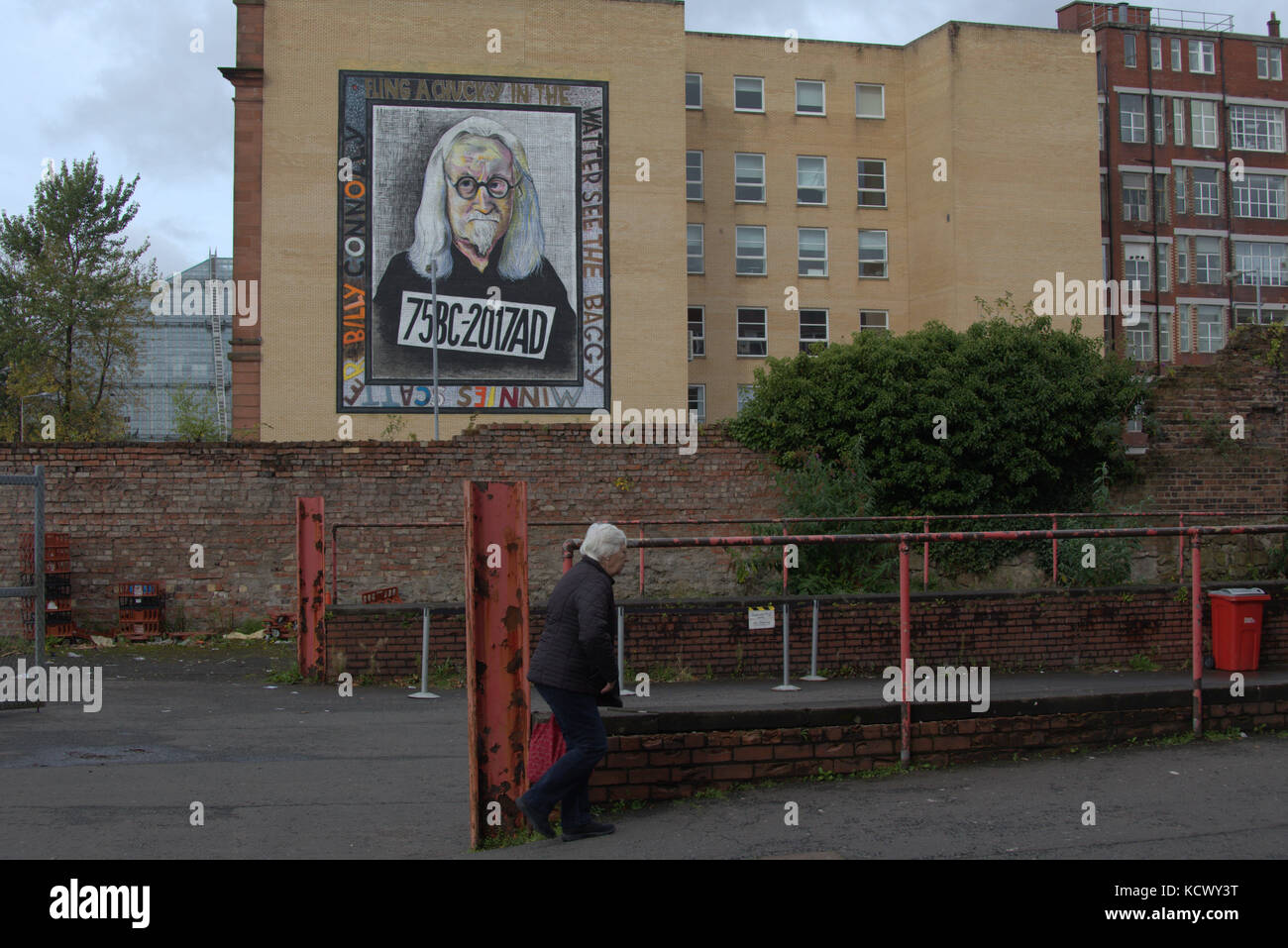 Billy Connolly Mural Artist John Byrne's portrait shows Billy Connolly as he is now  75th birthday Stock Photo