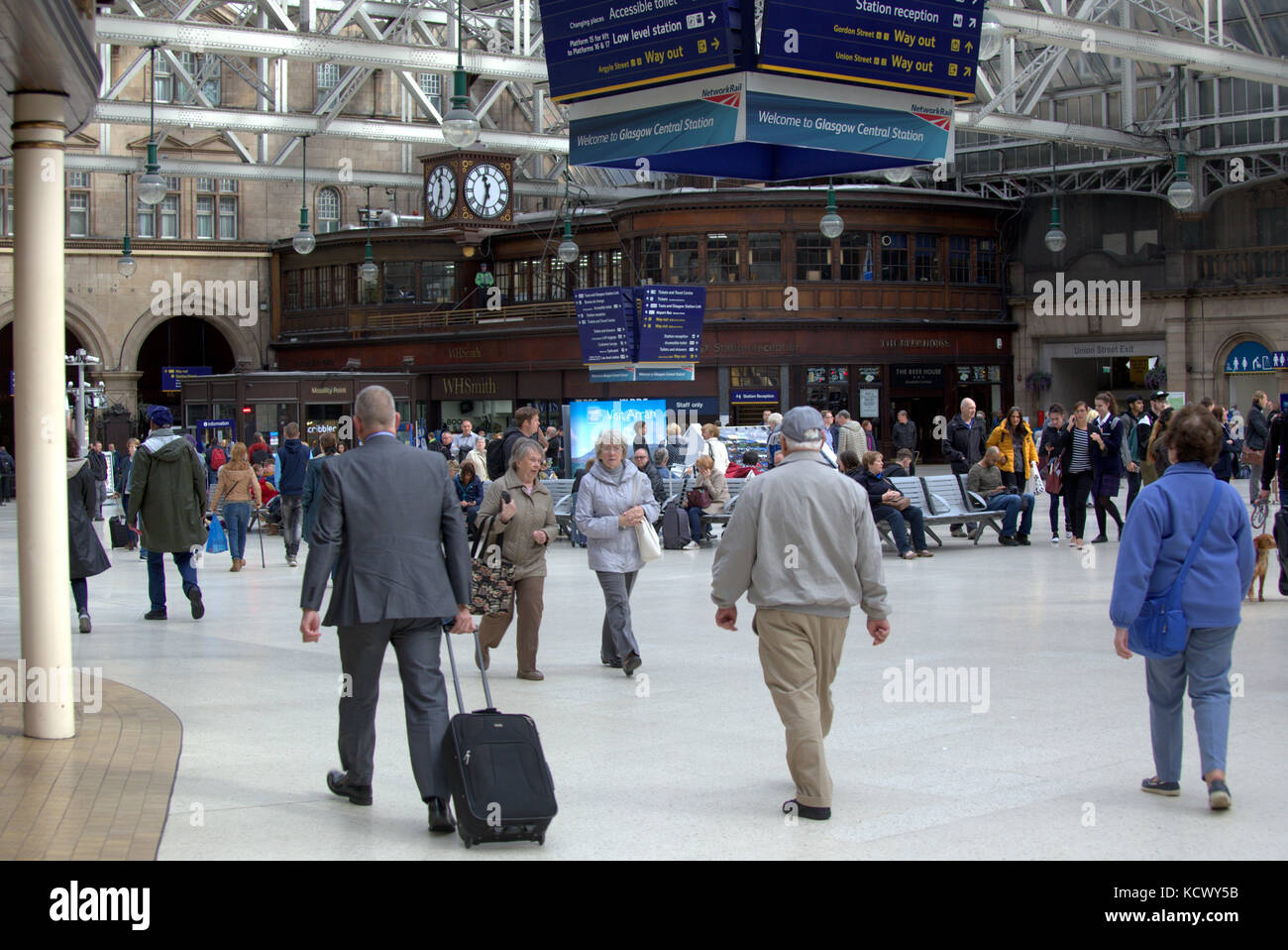 central station concourse station platform tourists and passengers Stock Photo