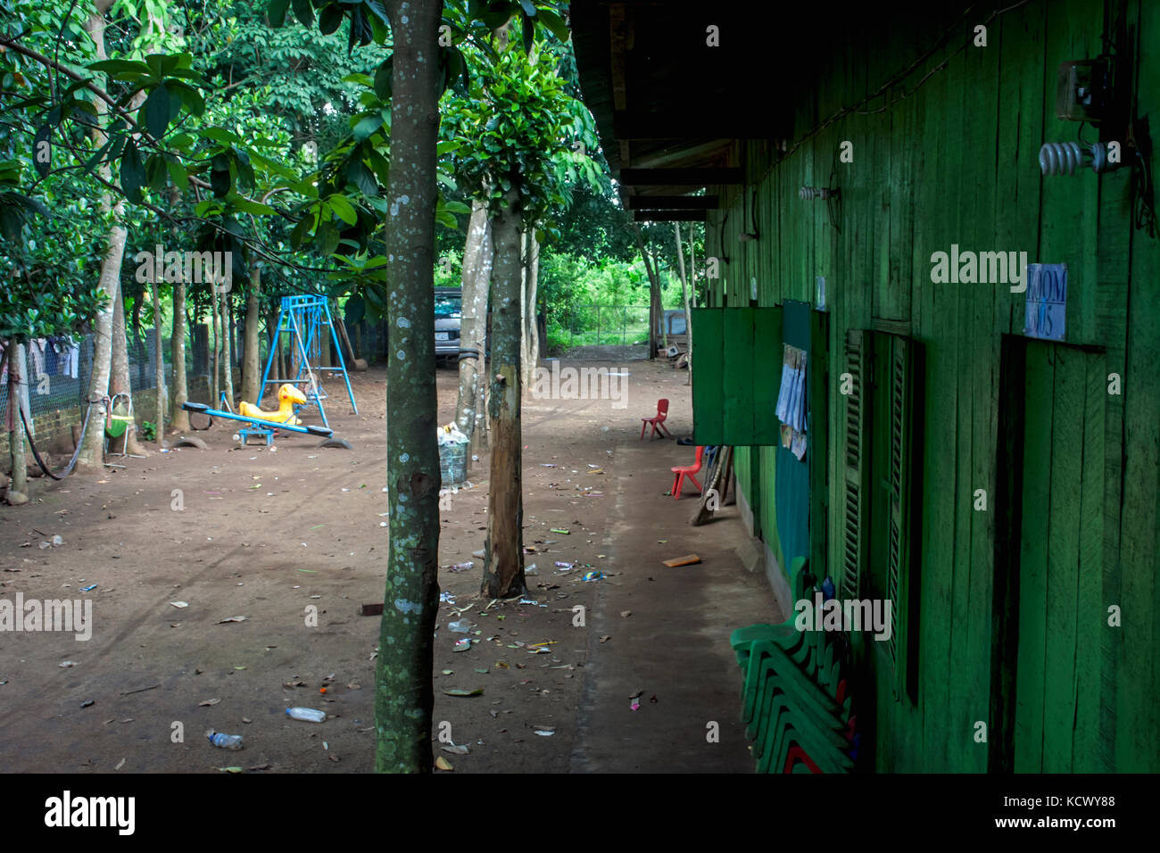 A dilapidated wooden school house serves English students in Tboung Khmum province, Cambodia. Stock Photo