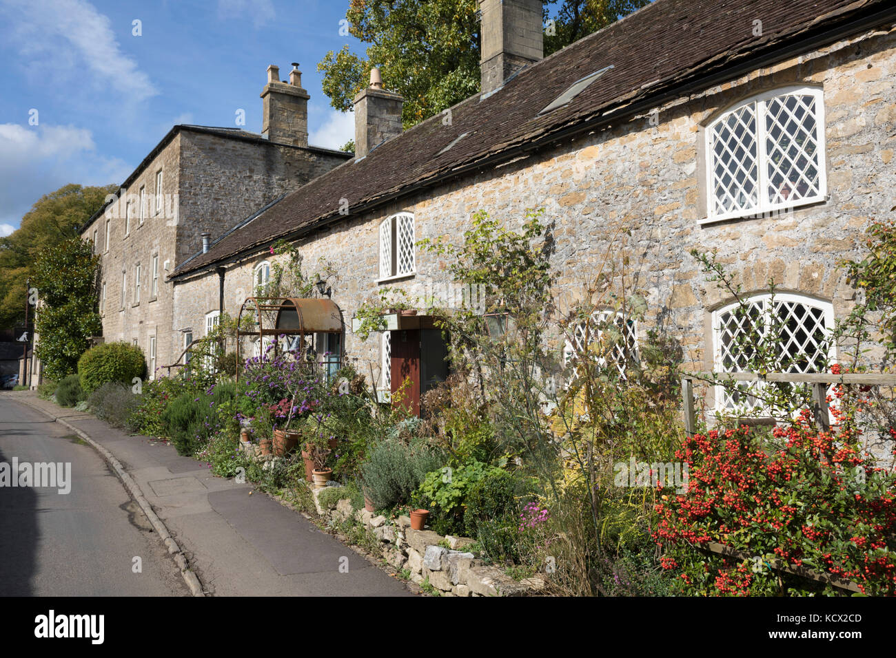 Line of traditional stone cottages, Mells, Somerset, England, United