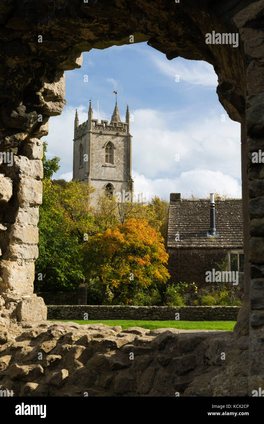 All Saint's Church viewed through window of ruined Nunney Castle, Nunney, near Frome, Somerset, England, United Kingdom, Europe Stock Photo