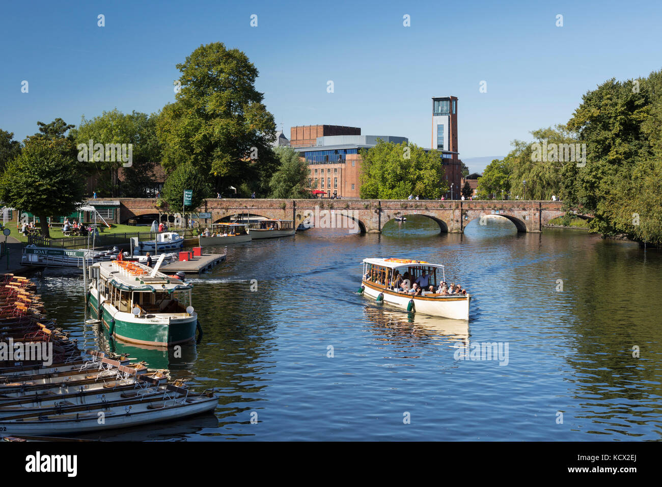 Tour boat on the River Avon with the Royal Shakespeare Theatre, Stratford-upon-Avon, Warwickshire, England, United Kingdom, Europe Stock Photo