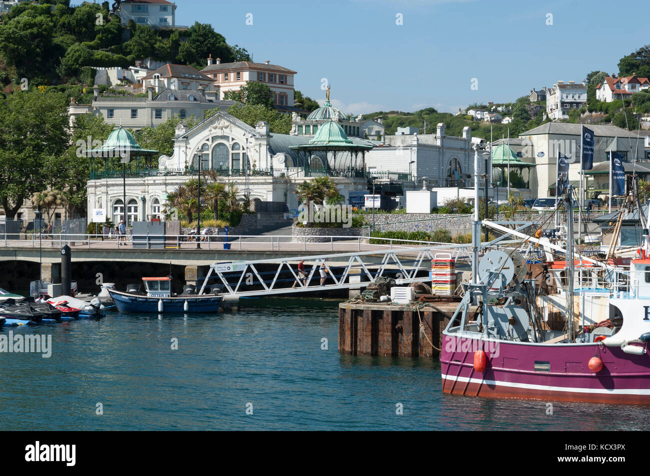 Fishing boat and gear in the harbour and marina at Torquay, Torbay, Devon. Princess Pavilion and promenade, boardwalk, slipway and moorings Stock Photo