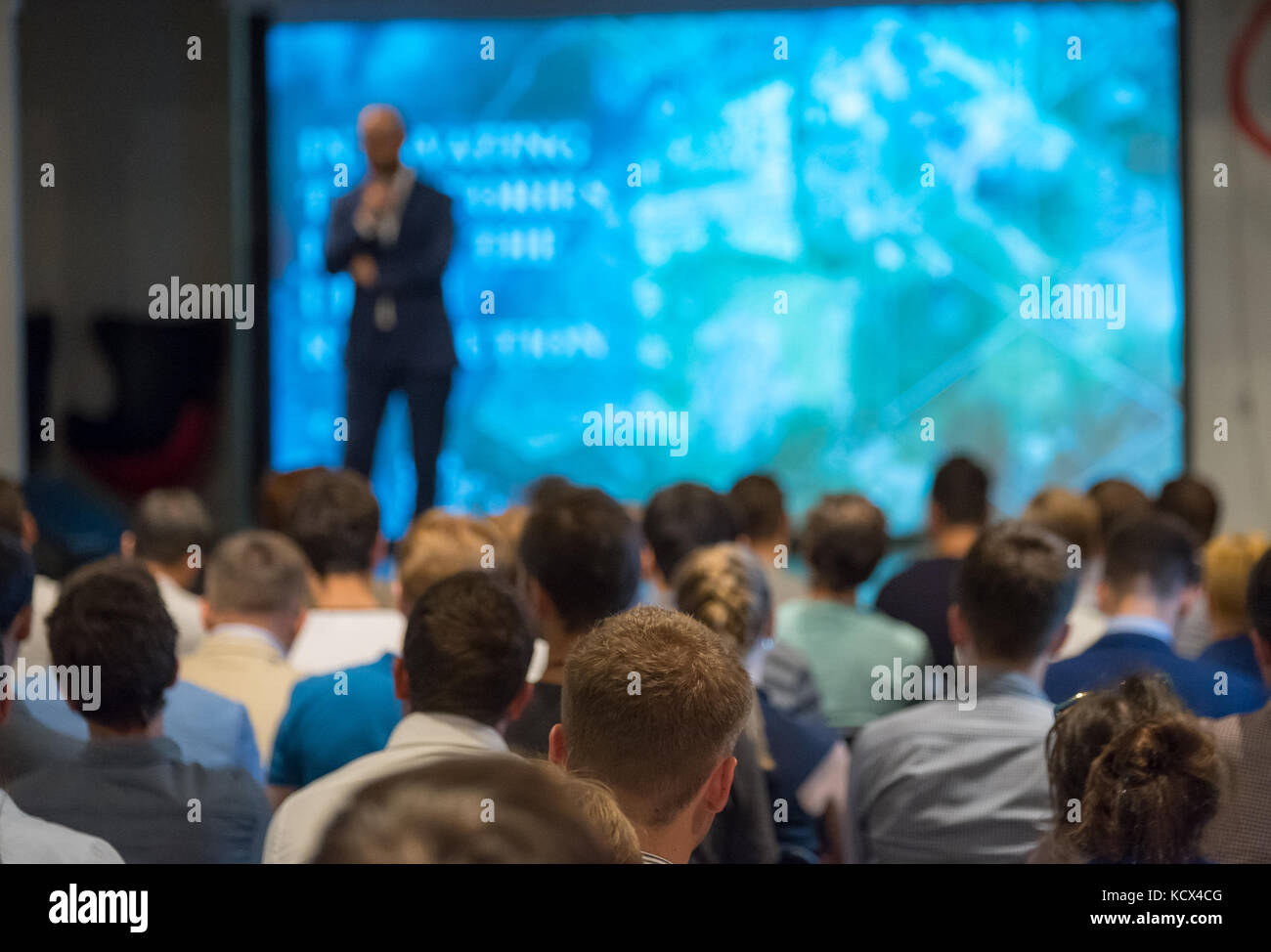 Audience listens to the lecturer Stock Photo - Alamy