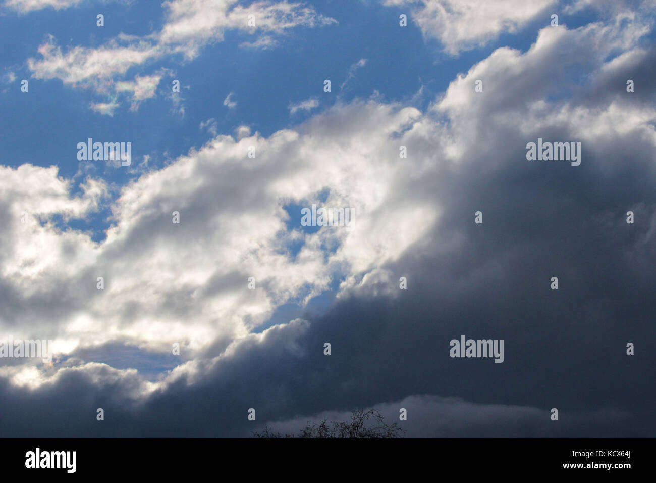Cloudy sky shot with dark and white clouds Stock Photo - Alamy