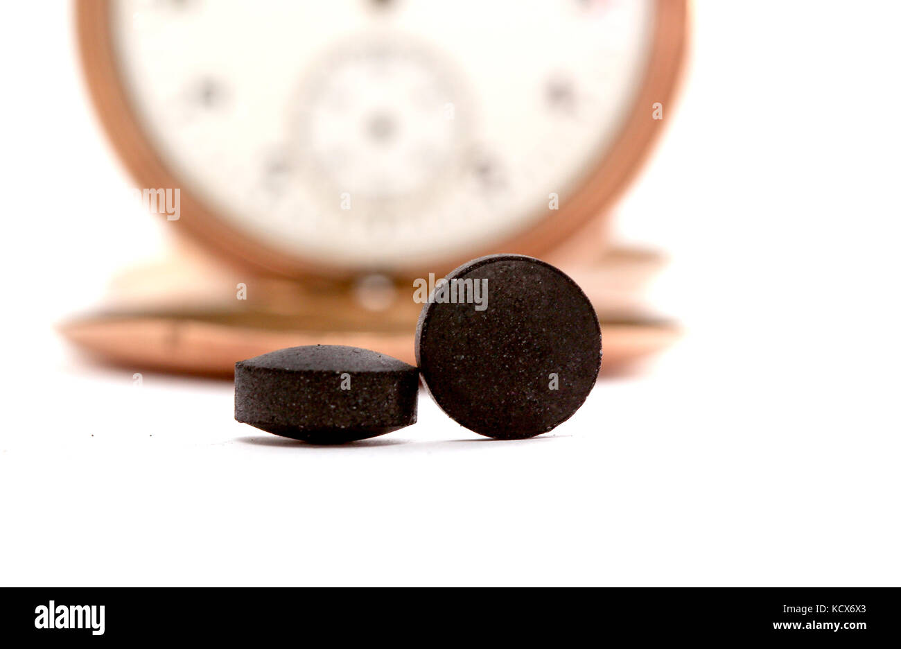 picture of a activated coal tablets isolated on white Stock Photo Alamy
