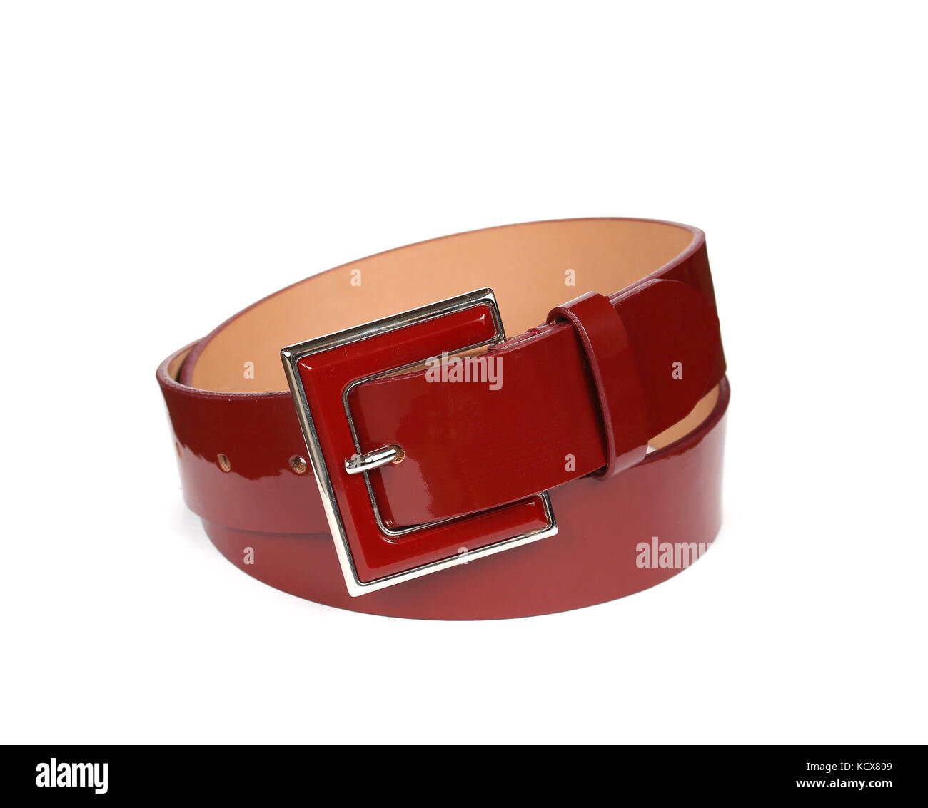 Fashionable shiny red patent leather belt on white background Stock Photo -  Alamy