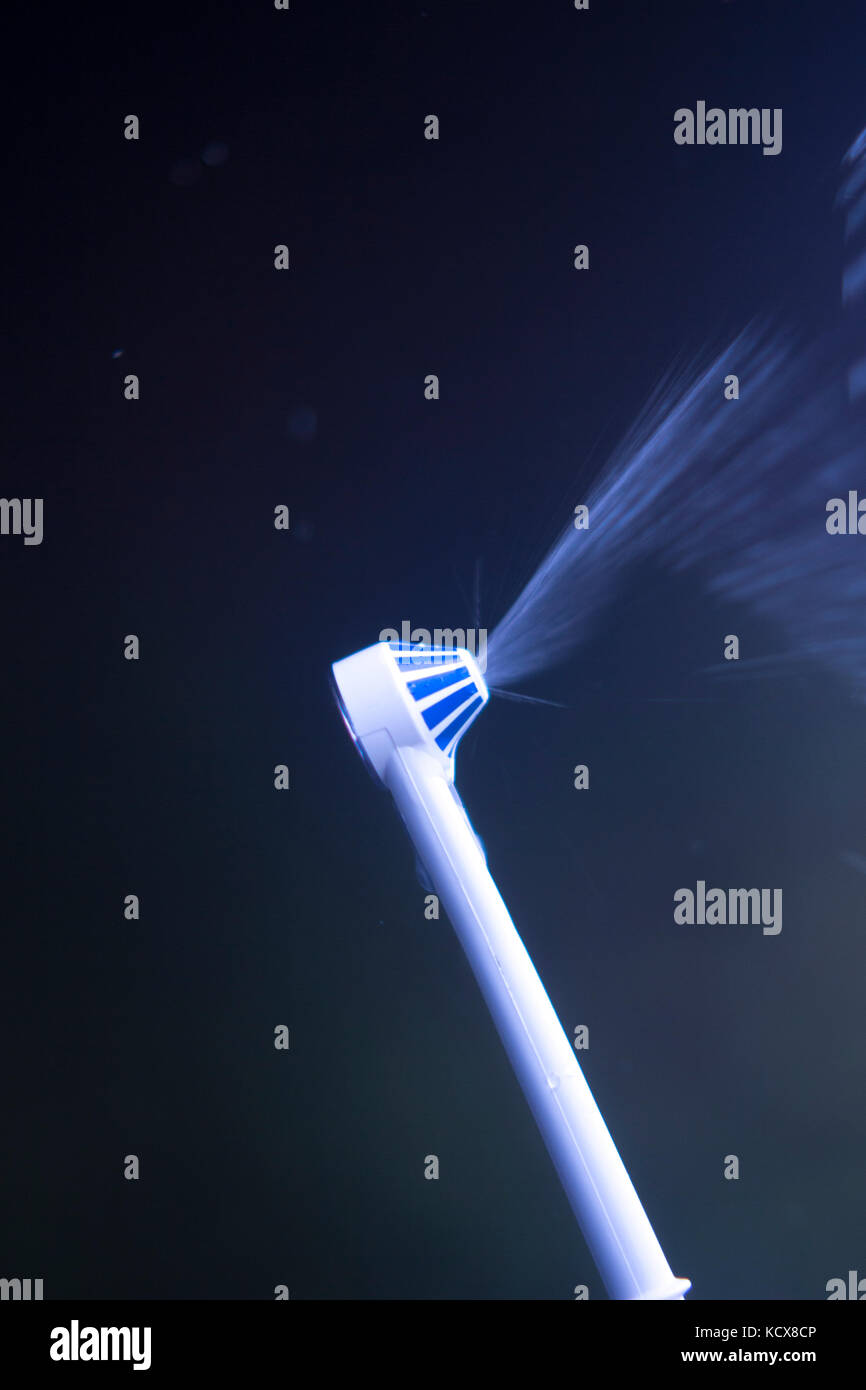 Dental water spray cleaner for interdental hygiene Stock Photo Alamy