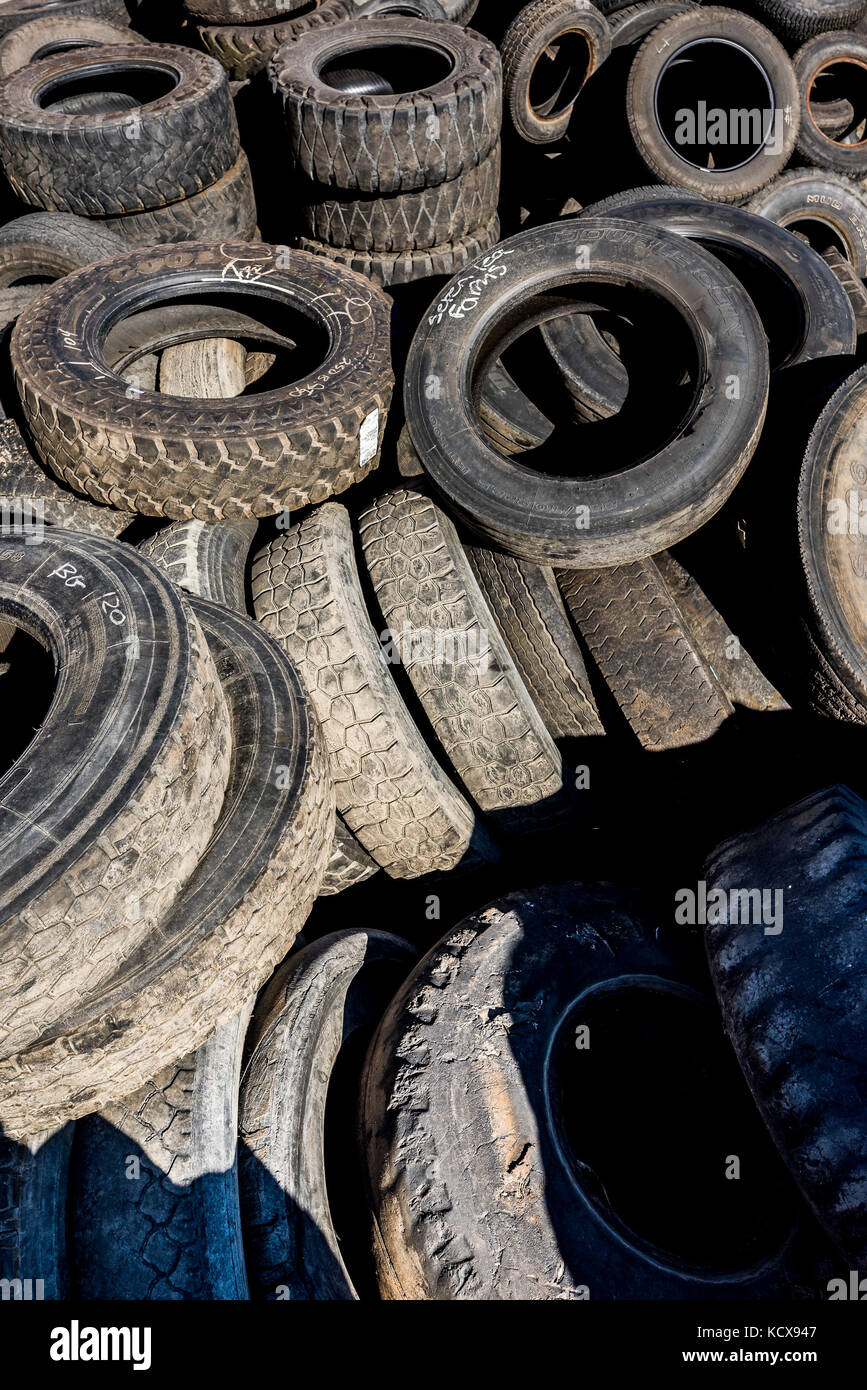 Pile of used cat tires Stock Photo