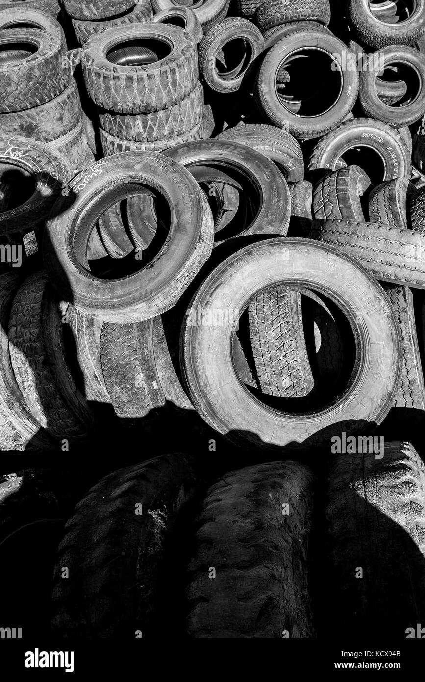 Pile of used cat tires Stock Photo