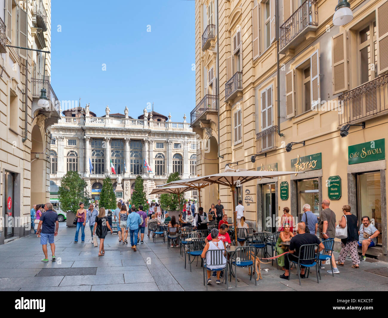 Sidewalk cafe on Via Giuseppe Garibaldi looking towards Piazza Castello, Turin, Piedmont, Italy Stock Photo