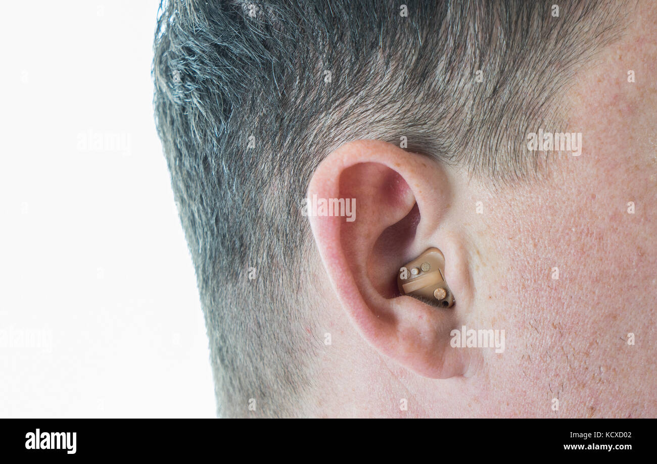 Man wearing hearing aid hires stock photography and images Alamy