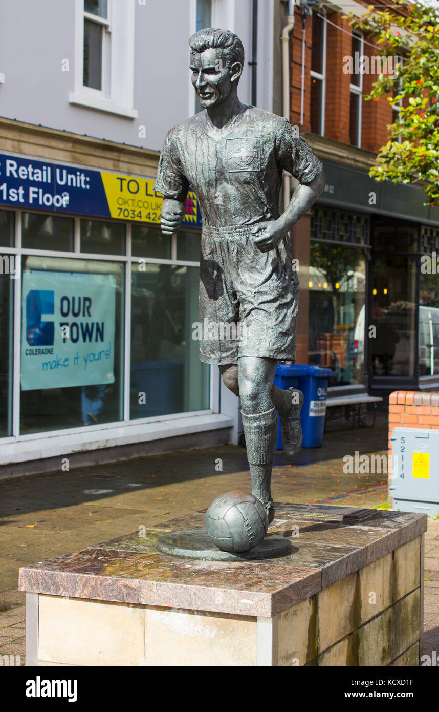 The statue of Bertie Peacock international footballer and manager of Northern Ireland in the Diamond in Coleraine town centre. Bertie played for Coler Stock Photo