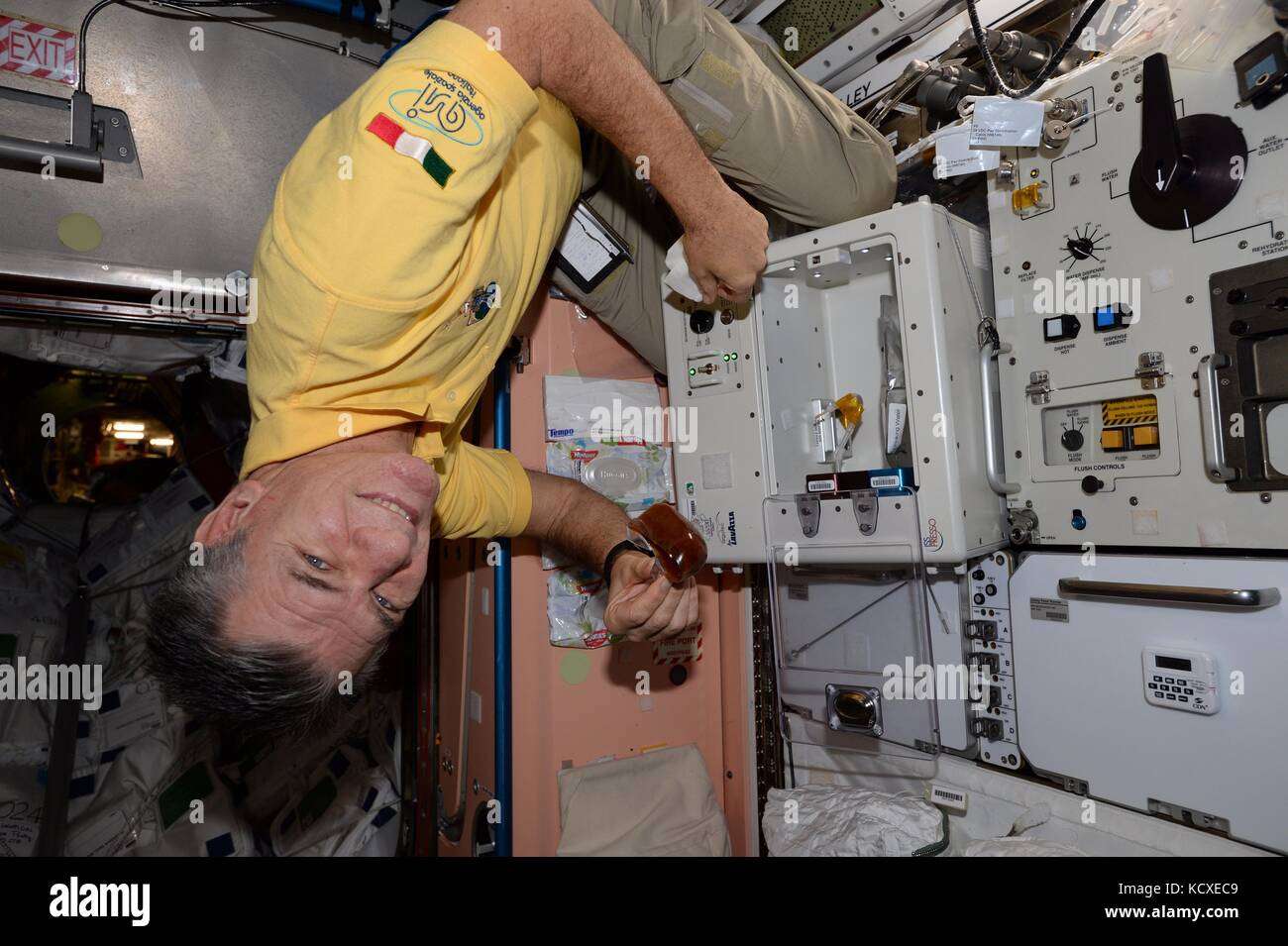 International Space Station Expedition 53 Italian astronaut Paolo Nespoli prepares an espresso coffee in space to celebrate World Coffee Day September 29, 2017 in Earth Orbit. Stock Photo