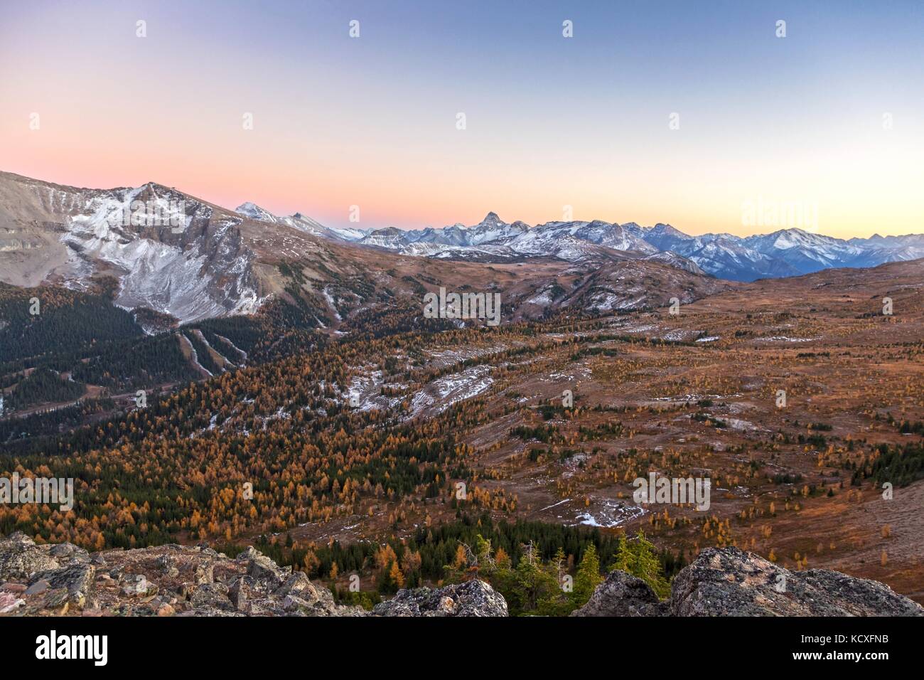 Autumn Sunset Landscape Panoramic View of Sunshine Meadows and Distant Mount Assiniboine in Banff National Park, Rocky Mountains Alberta Canada Stock Photo