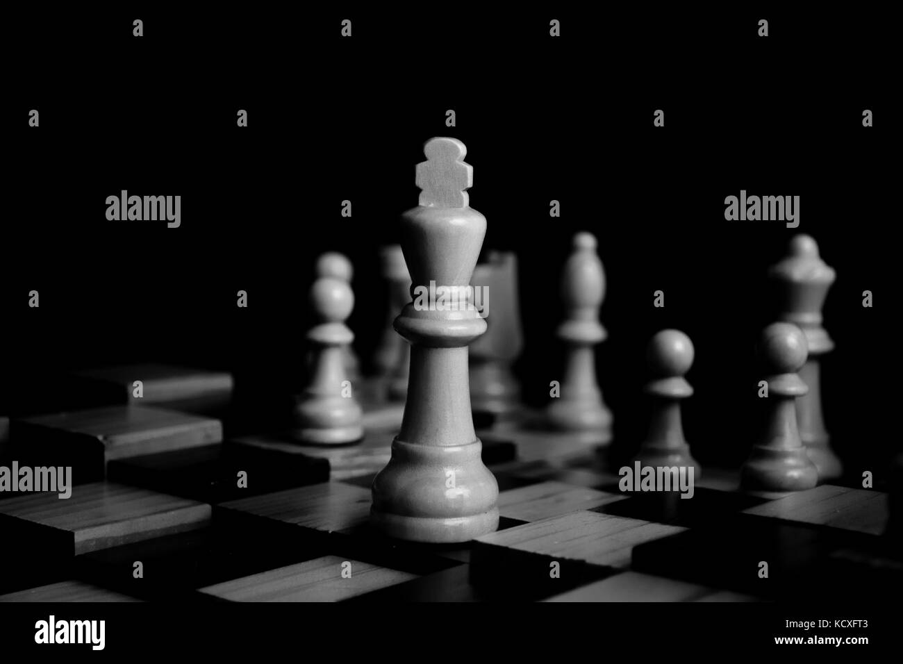 Chess pieces depict the struggles of good Stock Photo