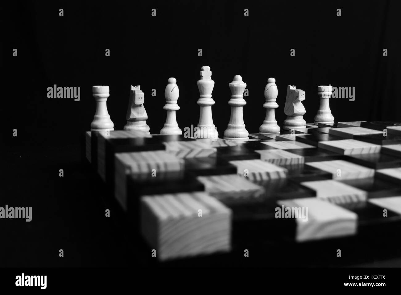 Low light photo of chess pieces and board Stock Photo