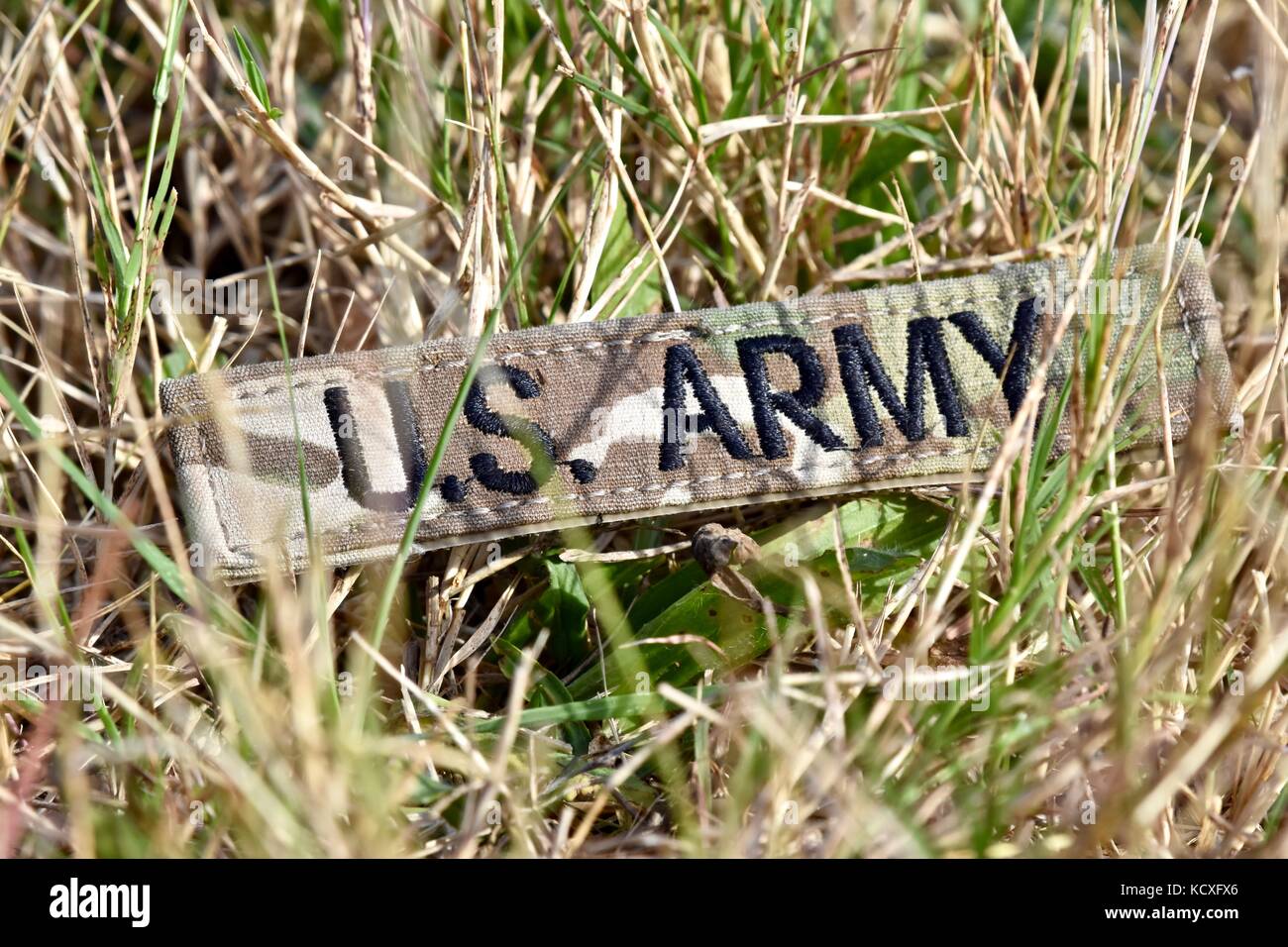 U.S. Army uniform piece on the ground Stock Photo