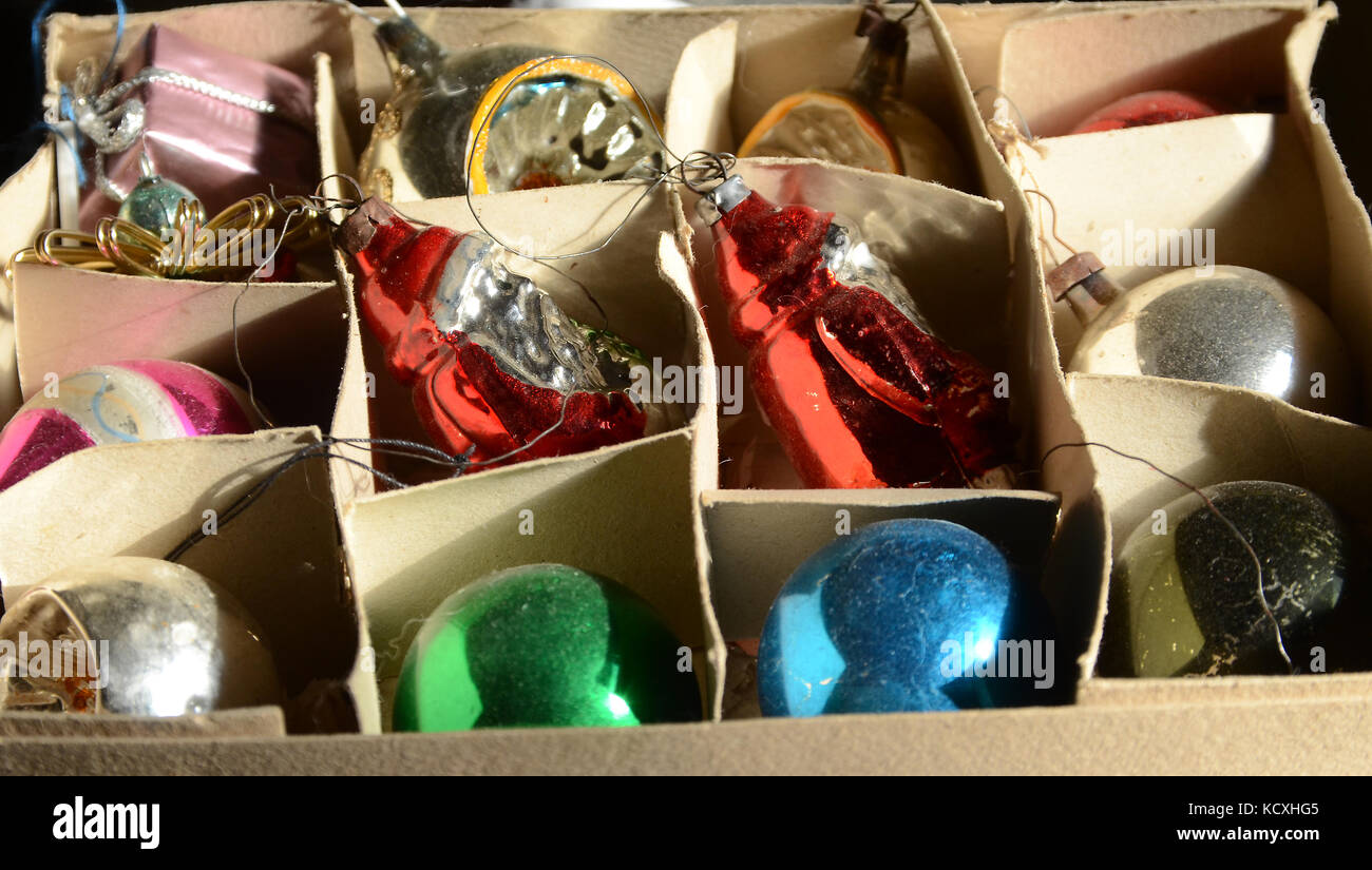 1960's christmas tree decorations laying in the store box, ready for use again. Stock Photo