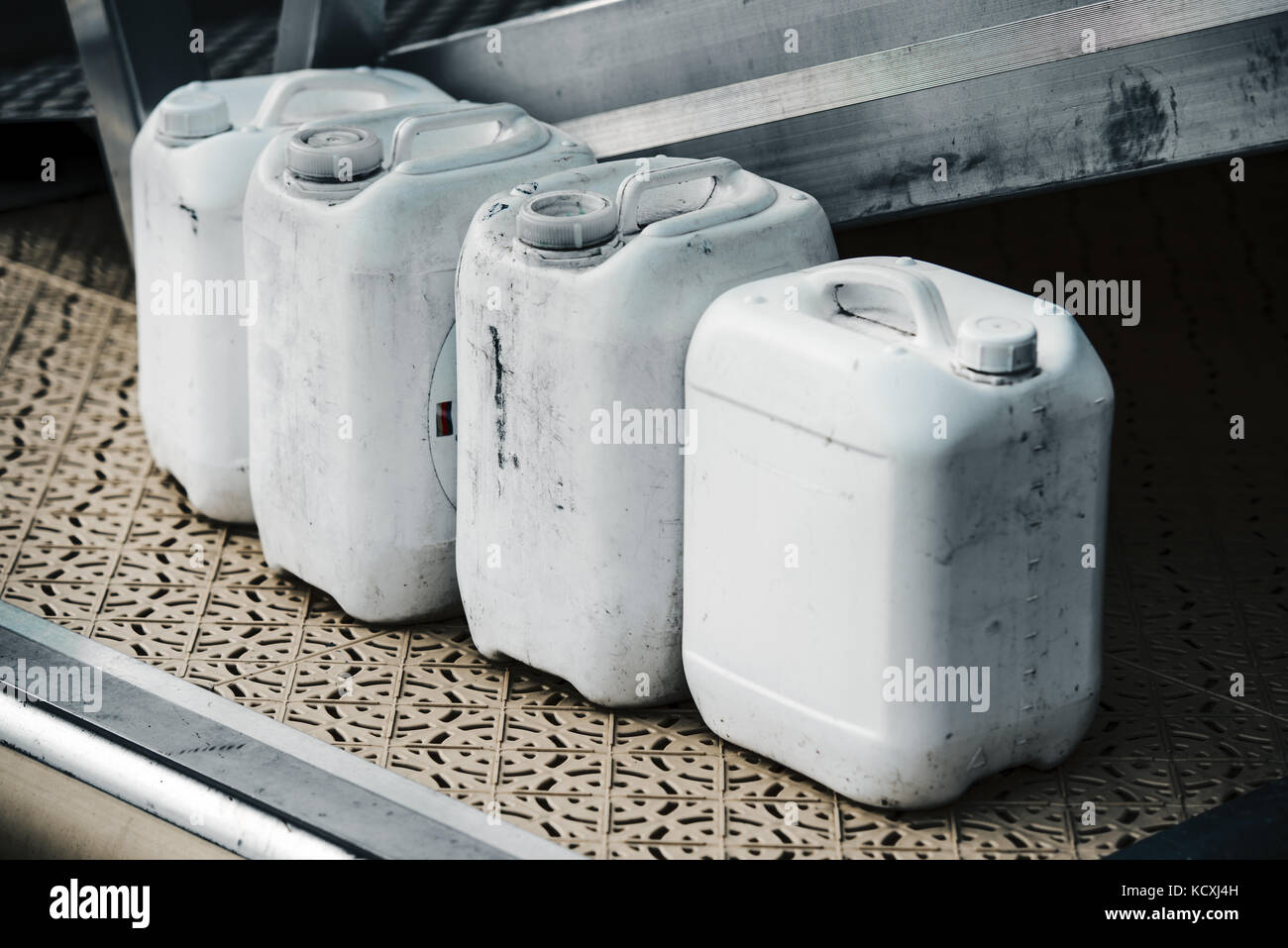 Four used old dirty plastic container Stock Photo Alamy