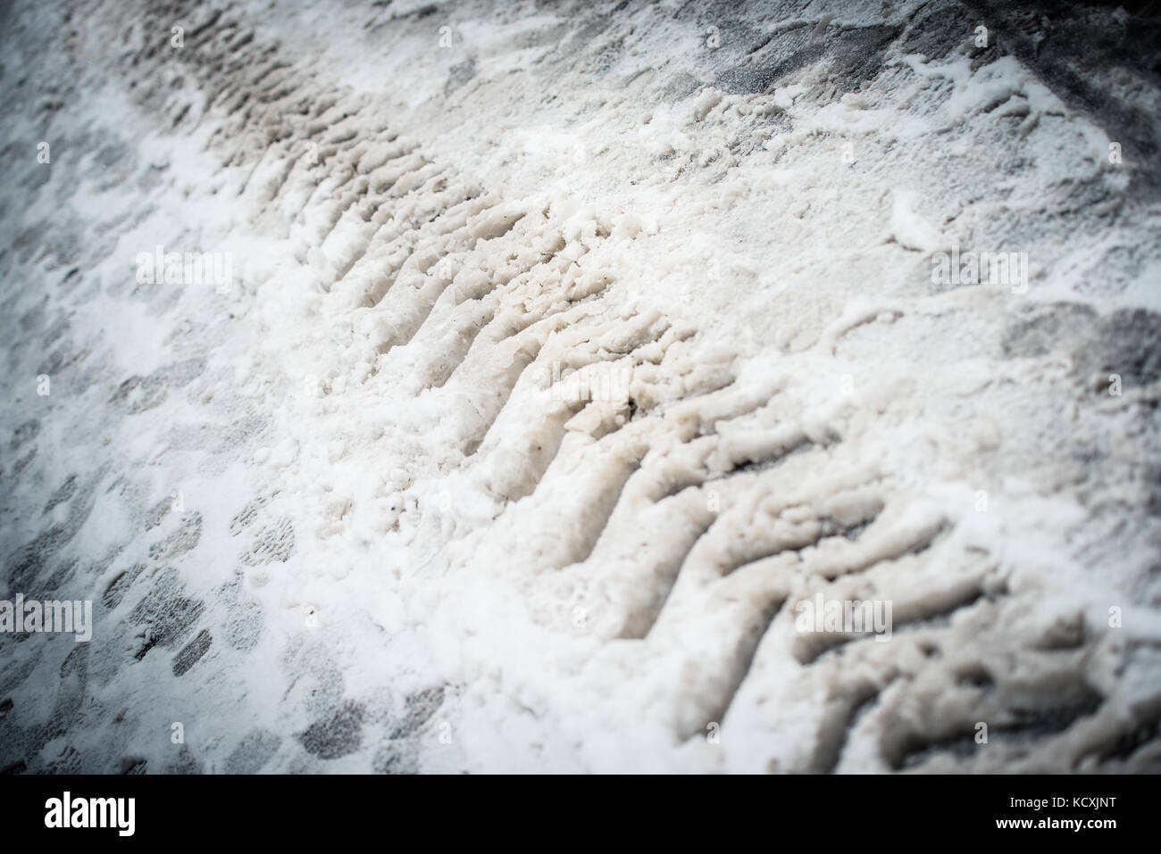 Street snow winter car traces Stock Photo - Alamy