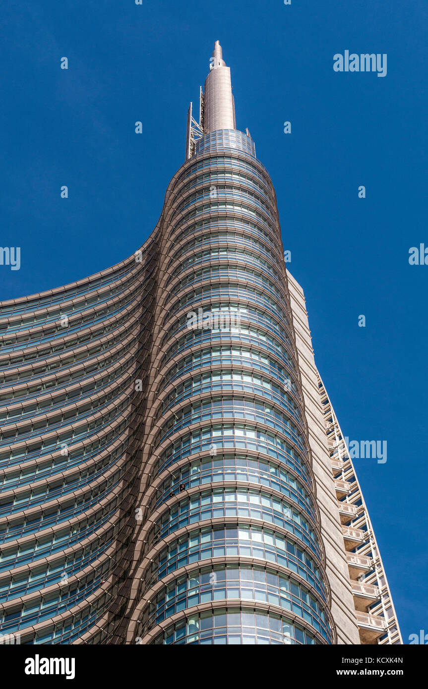 Milan: the spire of the Unicredit Tower in Gae Aulenti Square, the tallest skyscraper in Italy designed by Cesar Pelli, headquarters of UniCredit Bank Stock Photo