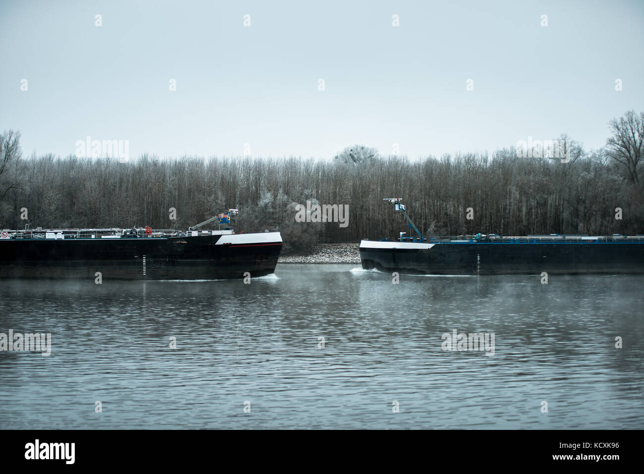 Two Ships on a river in huge fog mist cold winter day Stock Photo - Alamy