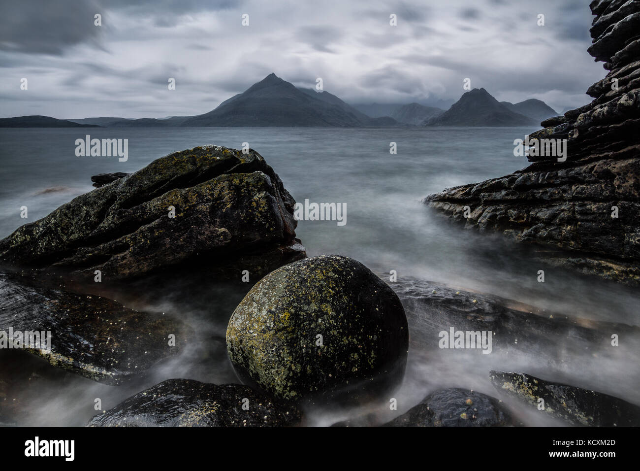 Elgol Beach With The Cuillin Mountains in the distance. Isle Of Skye, Scotland, UK Stock Photo