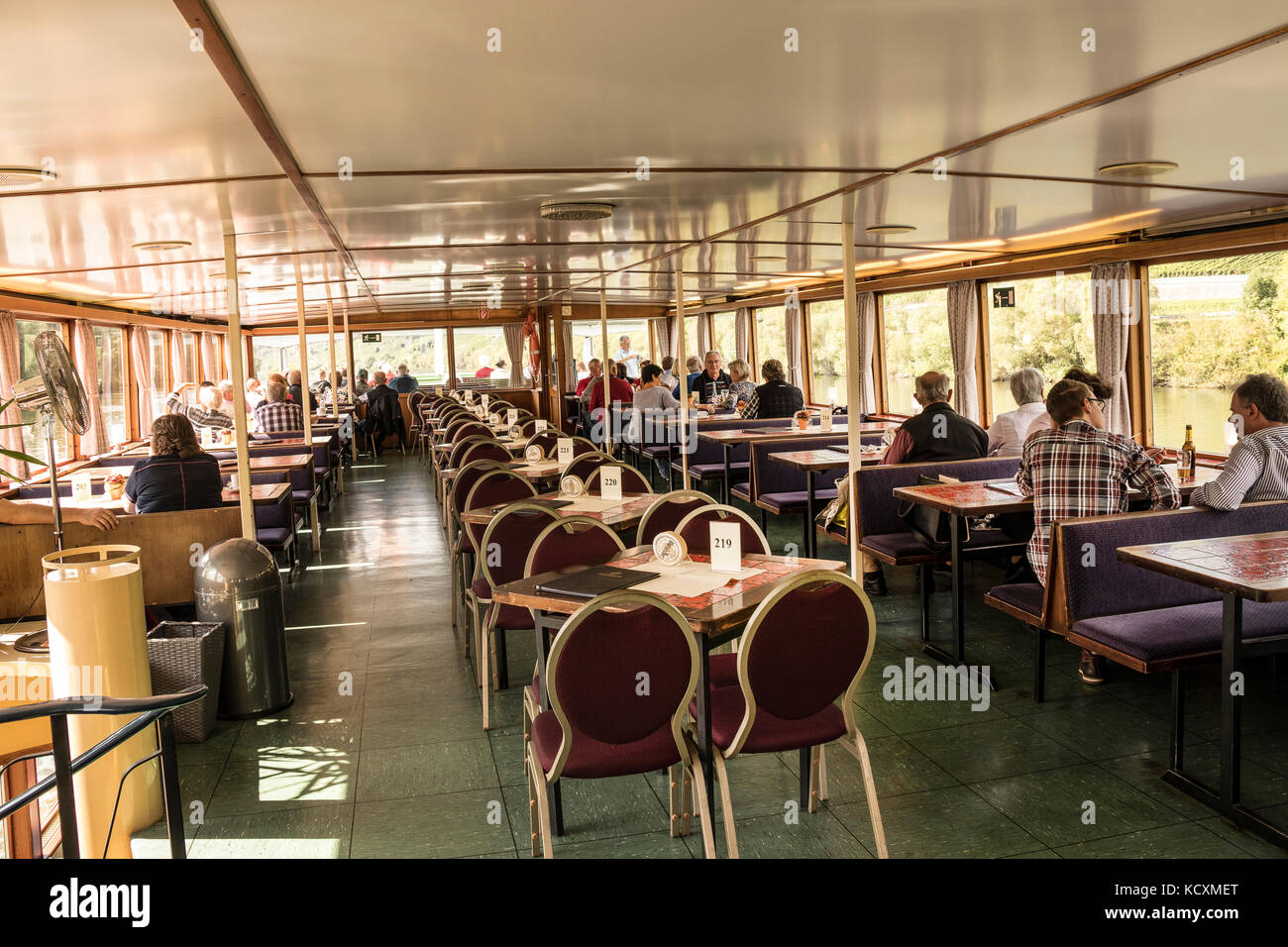 In the cabin of the pleasure trip boat Romantica on the Mosel River, Germany Stock Photo