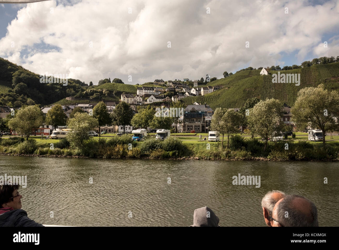 View of Urzig and the vineyards from a pleasure boat trip on the Mosel River, Germany Stock Photo