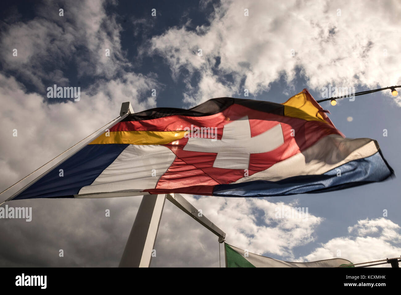 A multi-national European Flag  of European Nations showing the flags of Germany, Switzerland, Italy & France. Stock Photo