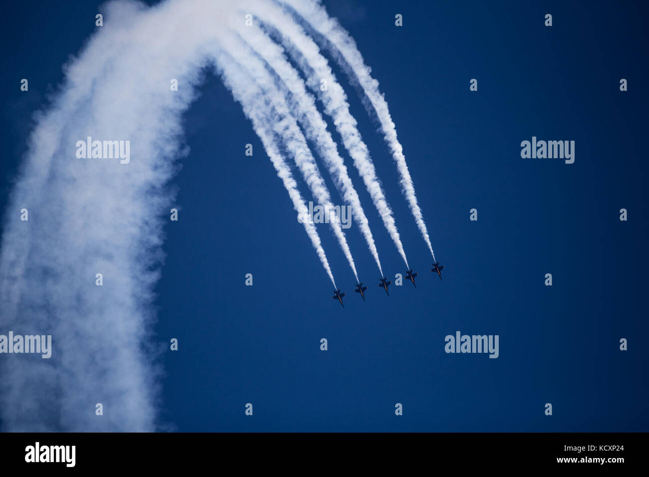 U.S. Navy Blue Angels perform an aerial maneuver in an air show during San Francisco Fleet Week 2017 Oct. 7. During their aerobatic demonstration the Blue Angels fly F/A-18 Hornet. San Francisco Fleet Week is an opportunity for the American public to meet their Marine Corps, Navy and Coast Guard teams and experience America’s sea services. Fleet Week will highlight naval personnel, equipment, technology, and capabilities, with an emphasis on humanitarian and disaster response. (U.S. Marine Corps photo by Lance Cpl. Adam Dublinske) Stock Photo