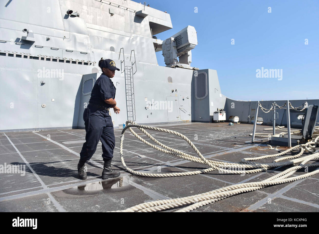 171007-N-PC620-0028  MAYPORT, Fla. (Oct. 7, 2017) Seaman Chanell McCray, a native of Newark, New Jersey, handles line during a sea-and-anchor evolution aboard the amphibious transport dock ship USS New York (LPD 21). New York departed Naval Station Mayport, Florida, to support the Gulf coast region in the event assistance is needed in the wake of Hurricane Nate. (U.S. Navy photo by Mass Communication Specialist Seaman Michael Lehman/Released) Stock Photo