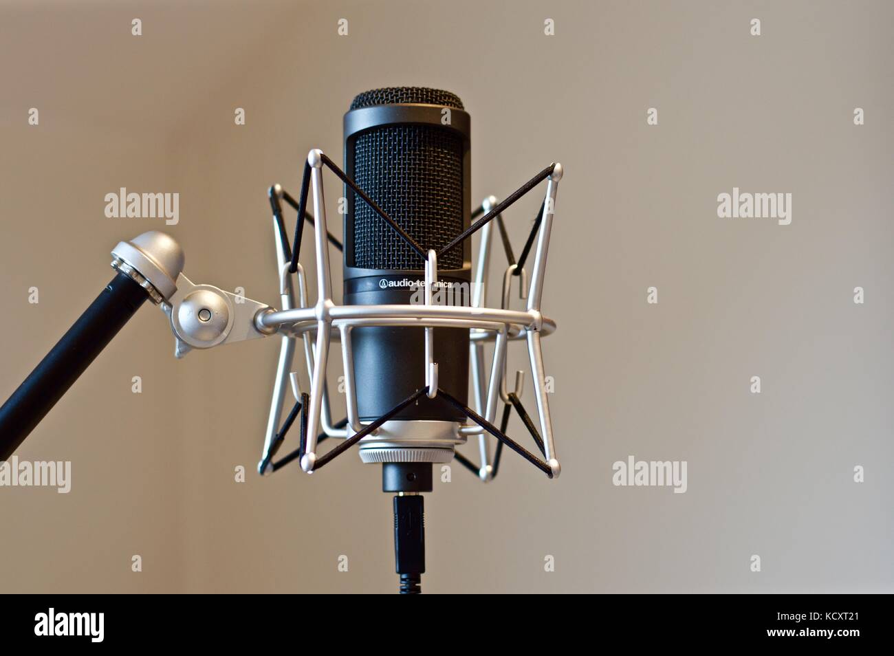 Home studio microphone on stand with shock mount Stock Photo